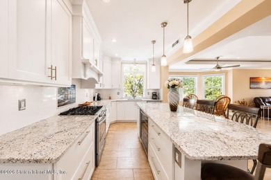 Welcome to 5434 Amboy Road - an exceptional legal two-family - photo 8