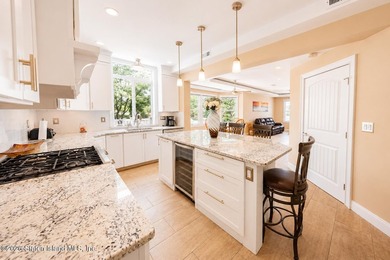 Welcome to 5434 Amboy Road - an exceptional legal two-family - photo 9