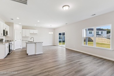 The Magnolia plan by Smith Family Homes is under construction in - photo 11