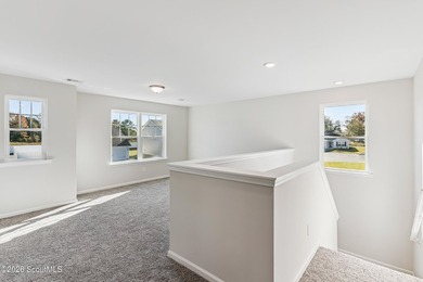 The Magnolia plan by Smith Family Homes is under construction in - photo 15