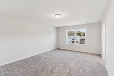 The Magnolia plan by Smith Family Homes is under construction in - photo 17