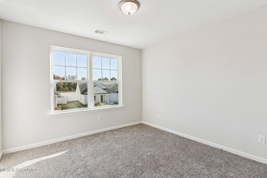 The Magnolia plan by Smith Family Homes is under construction in - photo 26