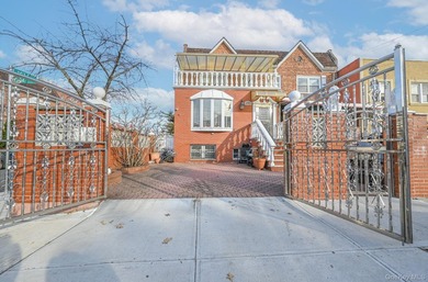 Welcome to this beautifully renovated legal two-family brick - photo 2