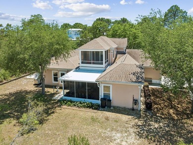 Tucked away in a secluded setting, this impressive three-bedroom - photo 4