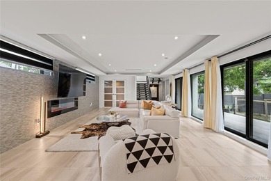 Set on an approximately 6,000 SF corner lot, this luxury - photo 2
