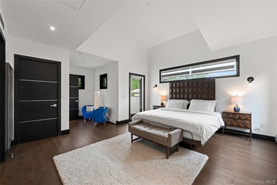 Set on an approximately 6,000 SF corner lot, this luxury - photo 9