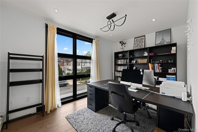 Set on an approximately 6,000 SF corner lot, this luxury - photo 10