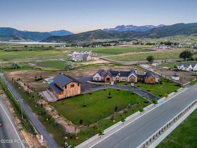 Set on more than four pristine acres beneath the iconic backdrop - photo 2