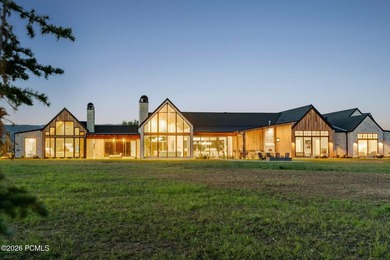 Set on more than four pristine acres beneath the iconic backdrop - photo 3