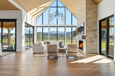 Set on more than four pristine acres beneath the iconic backdrop - photo 5