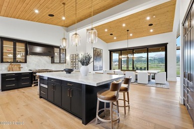 Set on more than four pristine acres beneath the iconic backdrop - photo 8