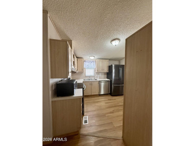 **ALL AGES with LOW lot rent** Welcome Home! Spacious corner-lot - photo 11