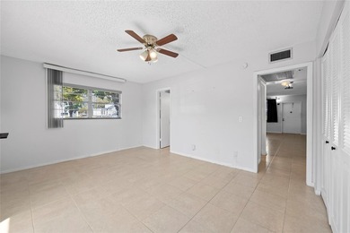 Spacious 1-bedroom, 1.5-bathroom condo conveniently located on - photo 16