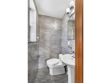 Welcome to this fully renovated luxury residence in the heart of - photo 4