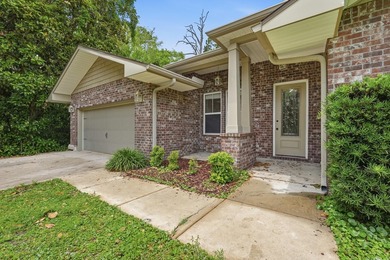 Beautifully maintained 4-bedroom, 3-bath brick home tucked away - photo 4