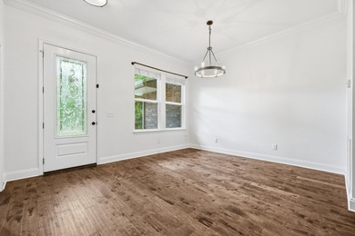Beautifully maintained 4-bedroom, 3-bath brick home tucked away - photo 6