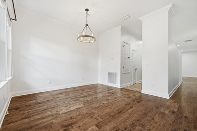 Beautifully maintained 4-bedroom, 3-bath brick home tucked away - photo 7