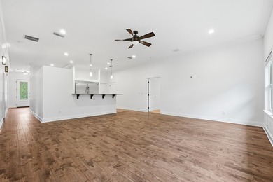 Beautifully maintained 4-bedroom, 3-bath brick home tucked away - photo 9