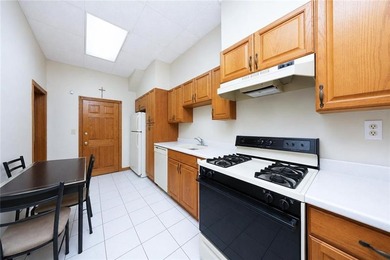 Welcome to this legal two-family solid brick home, conveniently - photo 7