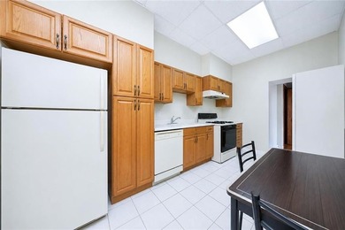 Welcome to this legal two-family solid brick home, conveniently - photo 8