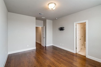 This jewel in the gated Merion community offers refined