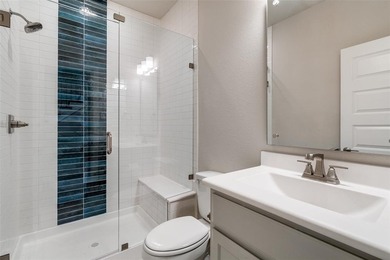 This jewel in the gated Merion community offers refined