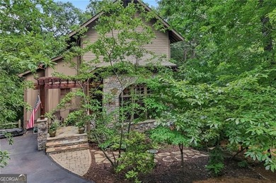Welcome to 63 Choctaw Ridge, a beautifully maintained Earth - photo 3