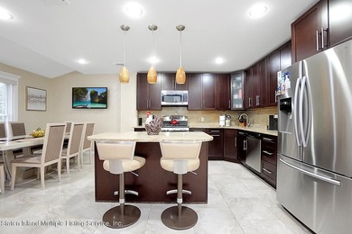 Welcome to 93 Shale Street! Amazing 1-family, 4-bedroom, 4-bath - photo 7