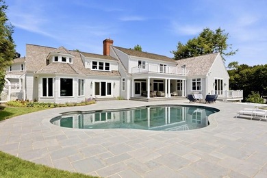 This meticulously renovated waterfront Cape on the bay is - photo 5
