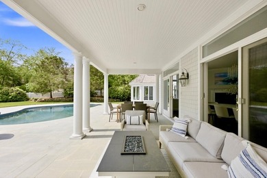 This meticulously renovated waterfront Cape on the bay is - photo 7