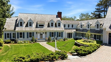 This meticulously renovated waterfront Cape on the bay is - photo 9
