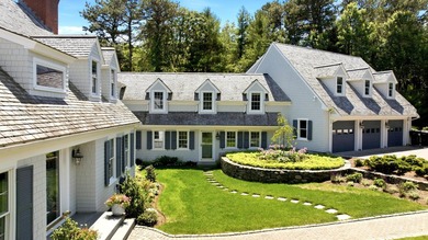 This meticulously renovated waterfront Cape on the bay is - photo 10