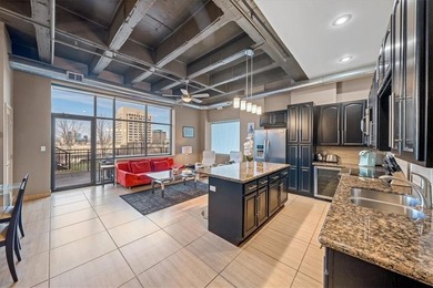 This stunning condo has million dollar views of the city