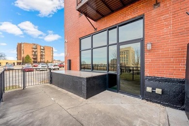 This stunning condo has million dollar views of the city