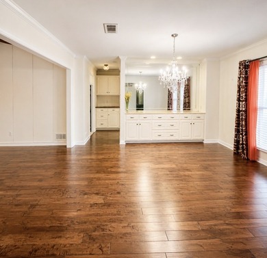 Nestled on a beautifully landscaped corner lot in the - photo 4