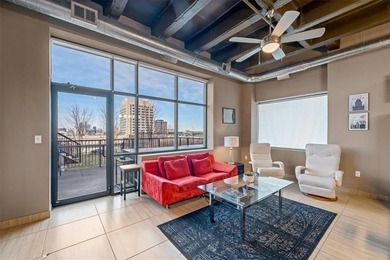 This stunning condo has million dollar views of the city