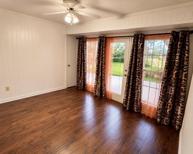 Nestled on a beautifully landscaped corner lot in the - photo 5