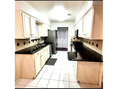 Nestled on a beautifully landscaped corner lot in the - photo 6