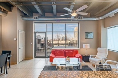 This stunning condo has million dollar views of the city