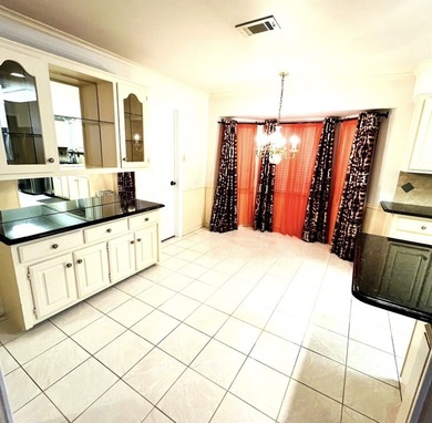 Nestled on a beautifully landscaped corner lot in the - photo 7