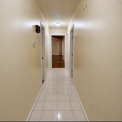 Nestled on a beautifully landscaped corner lot in the - photo 8