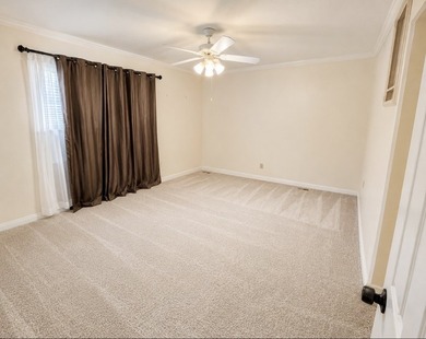 Nestled on a beautifully landscaped corner lot in the - photo 9
