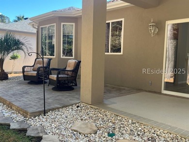 Step into this beautifully landscaped Acadia model, meticulously - photo 2