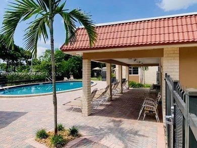 Welcome to this sun-filled condo where comfort meets style. The - photo 1
