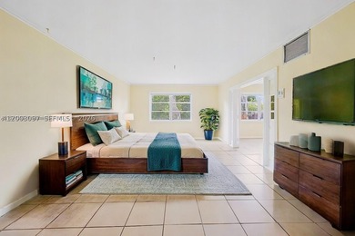 Welcome to this sun-filled condo where comfort meets style. The - photo 4