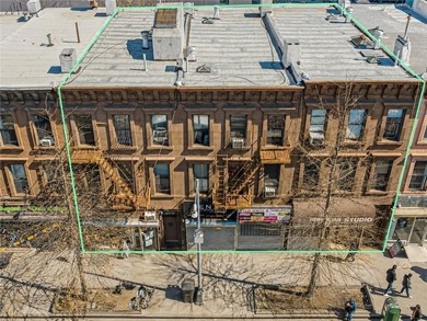 The sale of three adjoining mixed-use properties at 1231, 1233 - photo 1