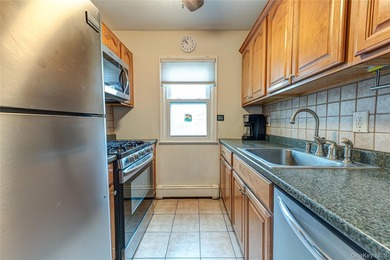 Customized second story corner unit in pristine condition - photo 11
