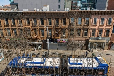 The sale of three adjoining mixed-use properties at 1231, 1233 - photo 5