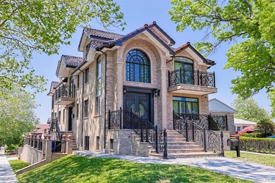 Welcome to this luxury detached two-family residence located in - photo 3