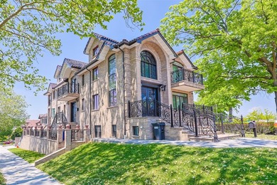 Welcome to this luxury detached two-family residence located in - photo 4